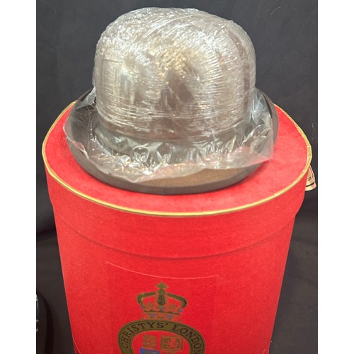 100 - Christy's red and gold display hat box, together with a black Christy bowler hat and a brown Christy... 