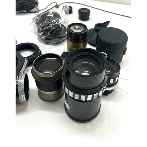 84 - Selection of lenses and one fine pix camera etc, untested