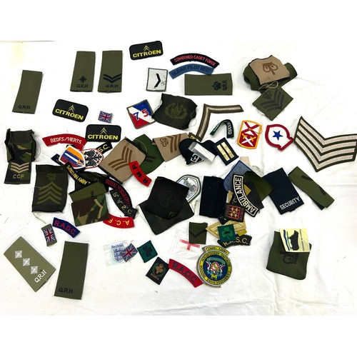 75 - Selection of military cloth badges