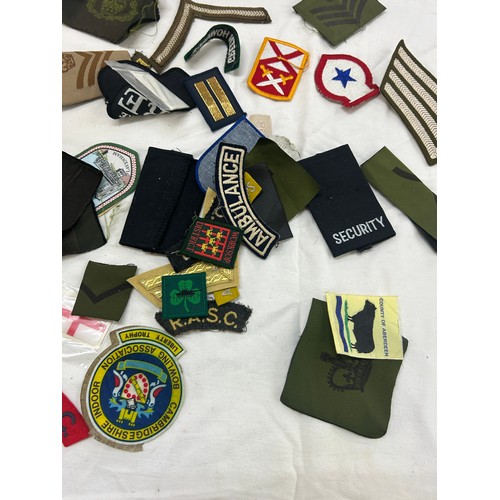 75 - Selection of military cloth badges