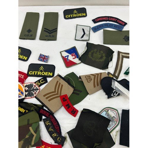 75 - Selection of military cloth badges