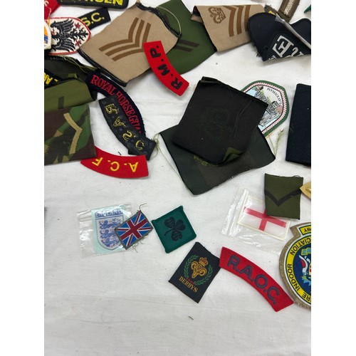 75 - Selection of military cloth badges