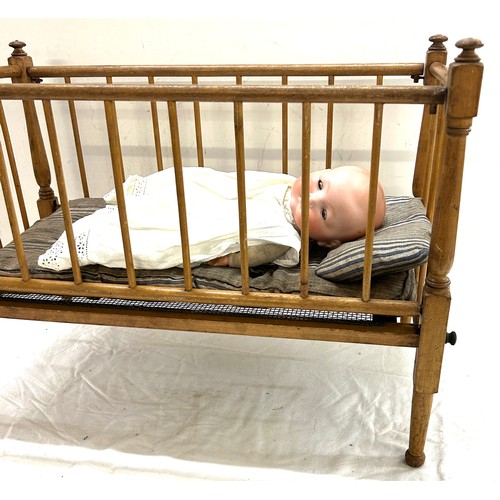 115 - Vintage German doll and cot