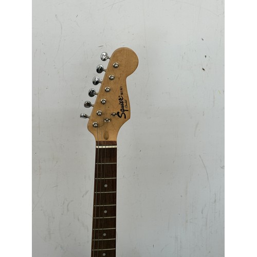 168 - Squier fender mini electric guitar, stand not included