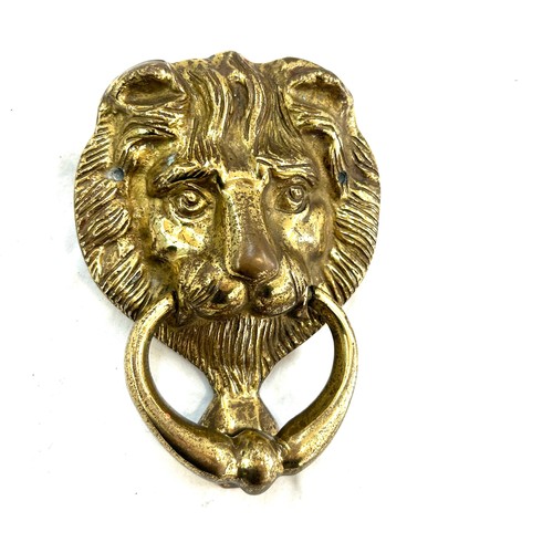 504 - Vintage lion head brass door knocker measures approx 6 inches long by 5 inches wide