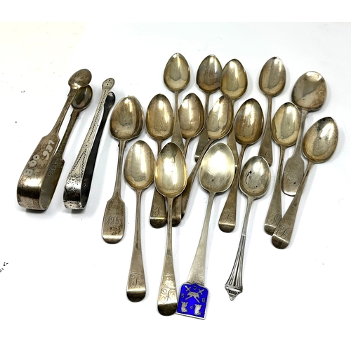 76 - Selection of silver tea spoons & sugar tongs weight 320g