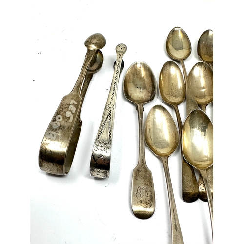 76 - Selection of silver tea spoons & sugar tongs weight 320g