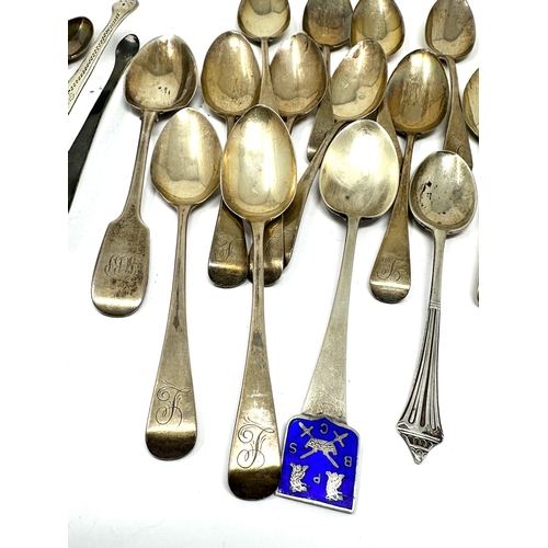 76 - Selection of silver tea spoons & sugar tongs weight 320g