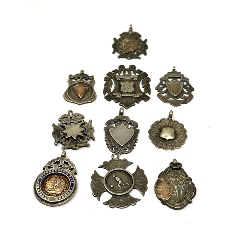 81 - 10 antique silver fobs