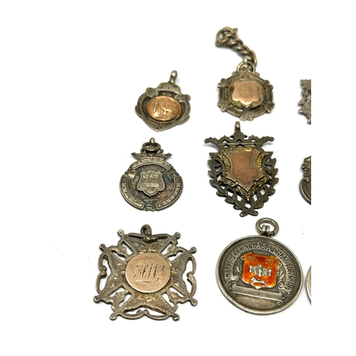 82 - 12 antique silver fobs