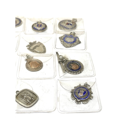 84 - 12 antique silver fobs