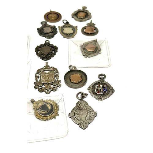 85 - 16 antique silver fobs