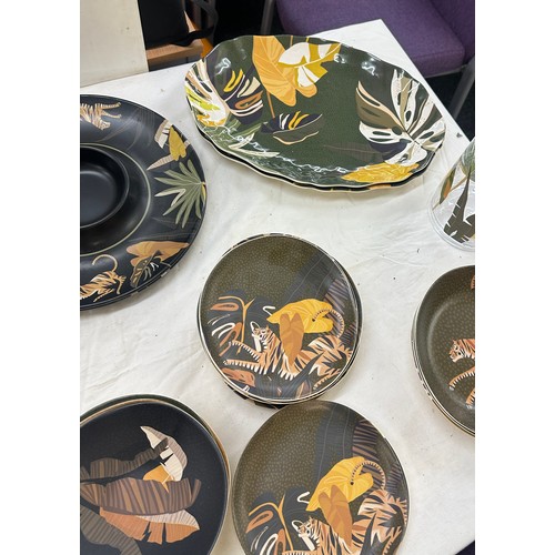 151 - Outdoor M&S matching animal print serving set to include cups, plates, serving plates, jug etc