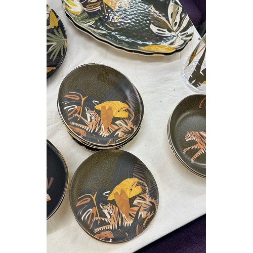 151 - Outdoor M&S matching animal print serving set to include cups, plates, serving plates, jug etc