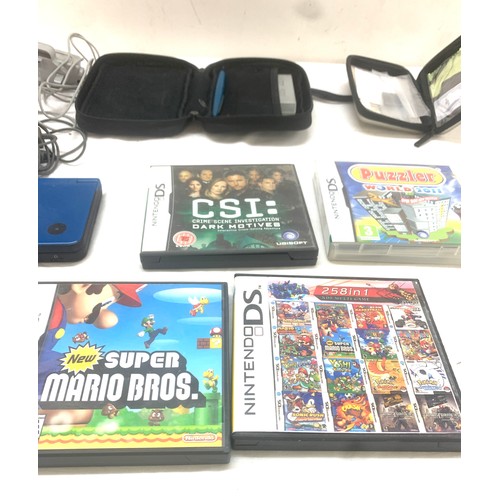 79 - Nintendo blue DS with charger, selection of games, all untested