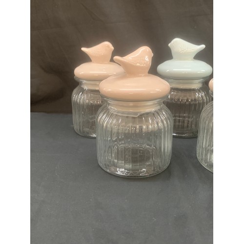 111 - Selection of 7 new glass jars, bird detailing to lids