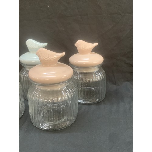 111 - Selection of 7 new glass jars, bird detailing to lids