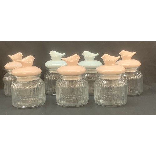 111 - Selection of 7 new glass jars, bird detailing to lids