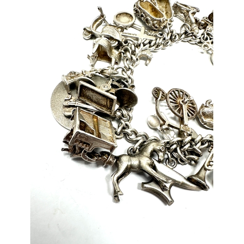 298 - Vintage silver charm bracelet weight 7050