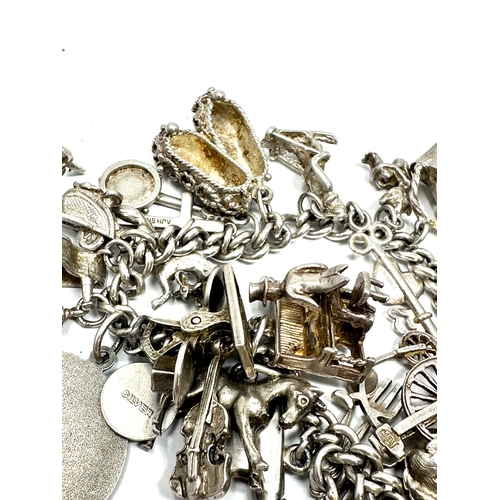 298 - Vintage silver charm bracelet weight 7050