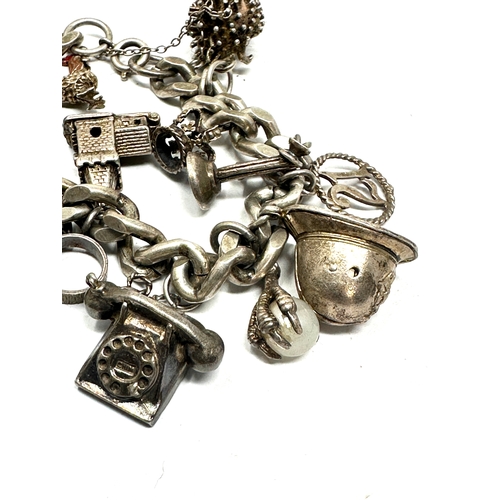 301 - Vintage silver charm bracelet weight 78g