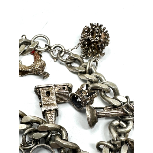 301 - Vintage silver charm bracelet weight 78g