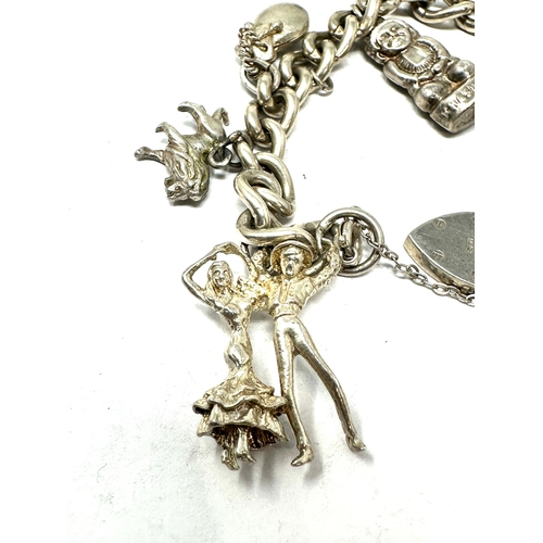 305 - Vintage silver charm bracelet & charms weight 45g