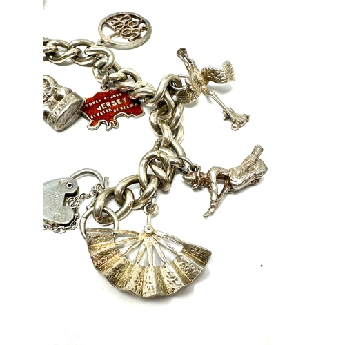 305 - Vintage silver charm bracelet & charms weight 45g