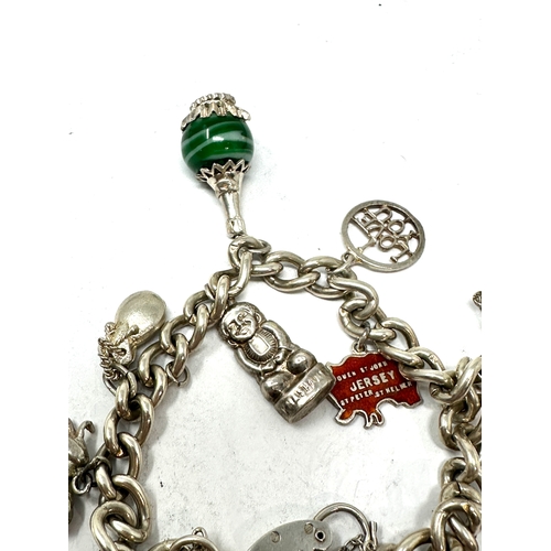 305 - Vintage silver charm bracelet & charms weight 45g