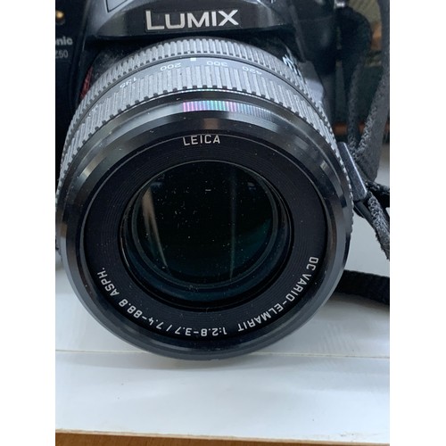 38 - Panasonic black Lumix  DMC-FZ48 12.1MP digital camera with lead, untested within case