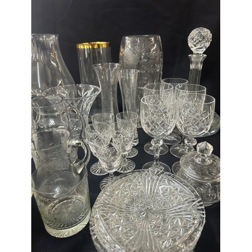 192 - Large selection of glassware to include cut glass pieces, items to include vases, bowls, ships decan... 