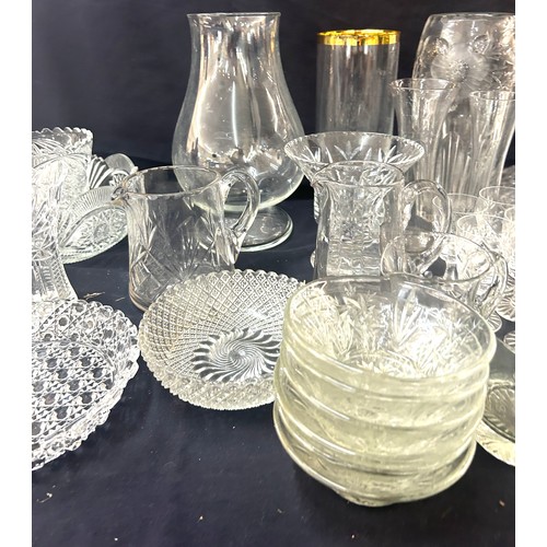 192 - Large selection of glassware to include cut glass pieces, items to include vases, bowls, ships decan... 