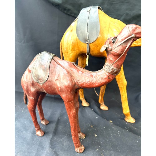 44 - 2 leather camel , tallest measures approximately 17 inches