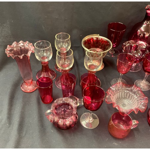 474 - Large selection of Cranberry glass to include vases, glasses, jug, vases etc