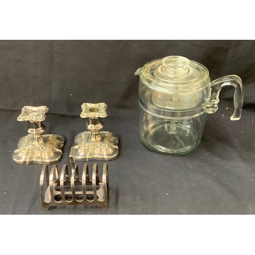 33 - Pair weighted silver plated candlesticks, silver plated toast rack, 1950's glass coffee percolator