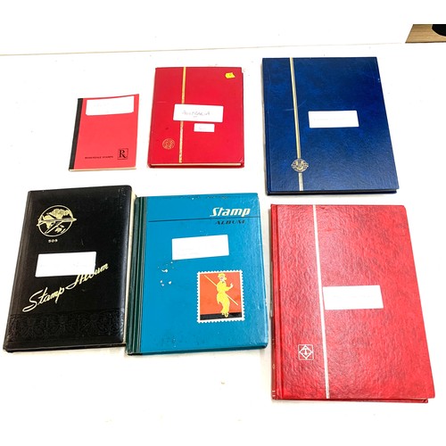 27 - Selection of stamp albums to include stamps from  Holland, Netherlands, Gambia, South West Africa, A... 