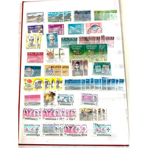 27 - Selection of stamp albums to include stamps from  Holland, Netherlands, Gambia, South West Africa, A... 