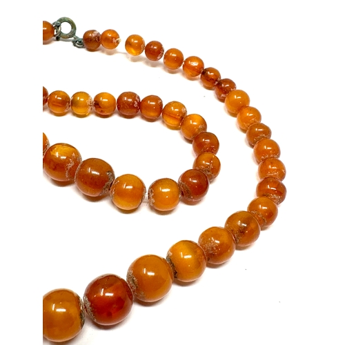 395 - Amber bead necklace weight 15.3g