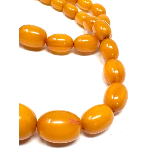 396 - Amber / bakelite bead necklace weight 40g