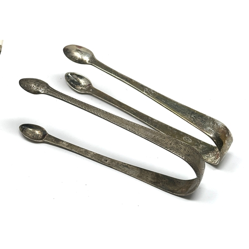 7 - 2 Georgian silver sugar tongs weight 72g