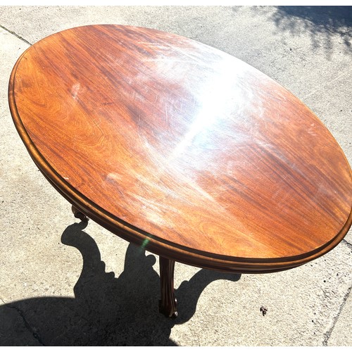 500A - Mahogany tilt top dining table, approximate measurements: Height 30 inches, Width 52 inches, Depth 4... 