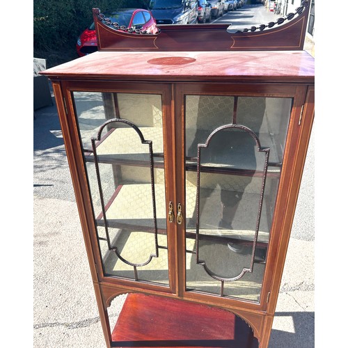 529 - Edwardian 2 door china cabinet with shelf beneath, approximate measurements: Height 69 inches, Width... 