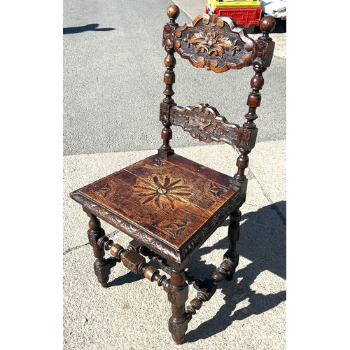 496 - Heavily carved Victorian hall chair