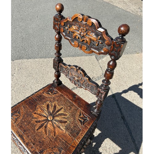 496 - Heavily carved Victorian hall chair