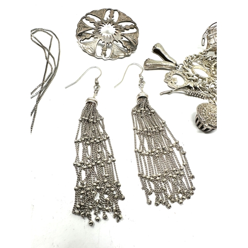 306 - Selection of silver jewellery inc long drop dangle earrings charm bracelet etc weight 64g