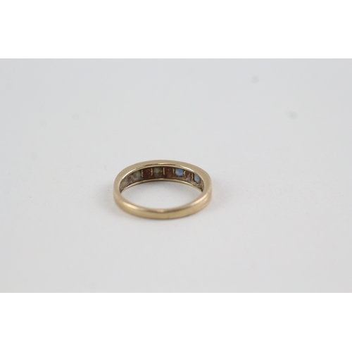 140 - 9ct gold sapphire and diamond channel setting ring (2.4g)