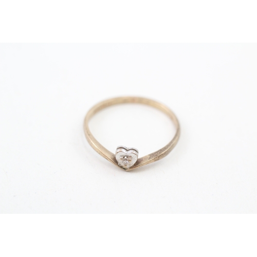 144 - 9ct gold diamond heart solitaire ring (1.3g)