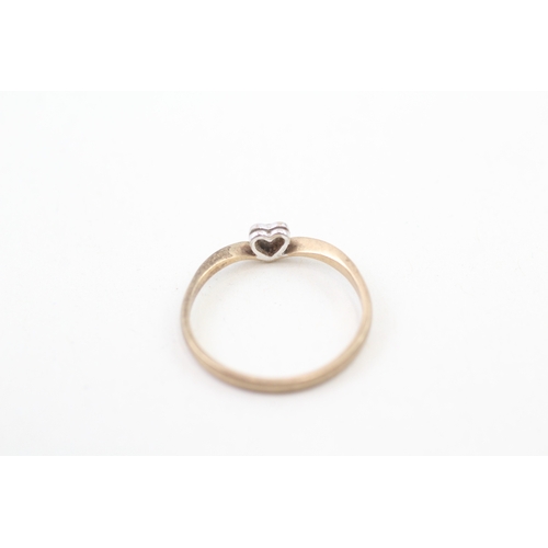 144 - 9ct gold diamond heart solitaire ring (1.3g)