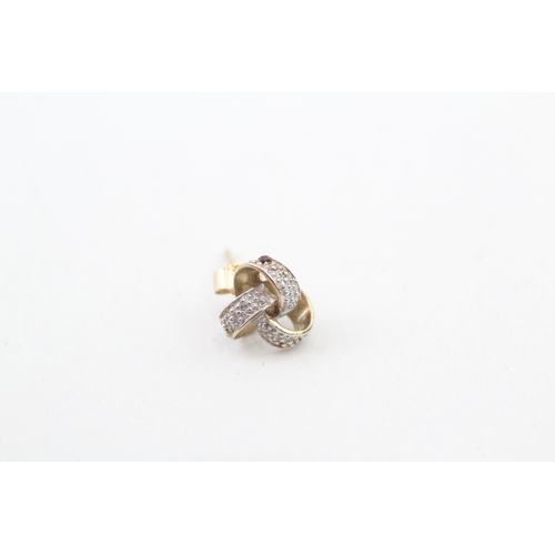 145 - 9ct gold diamond stud earrings (1.3g)