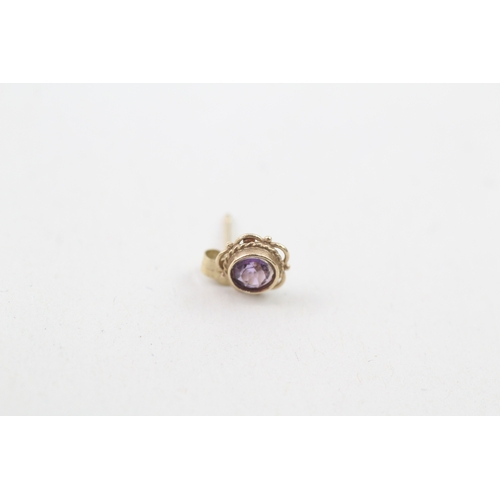 147 - 9ct gold and amethyst bezel set stud earrings (0.6g)